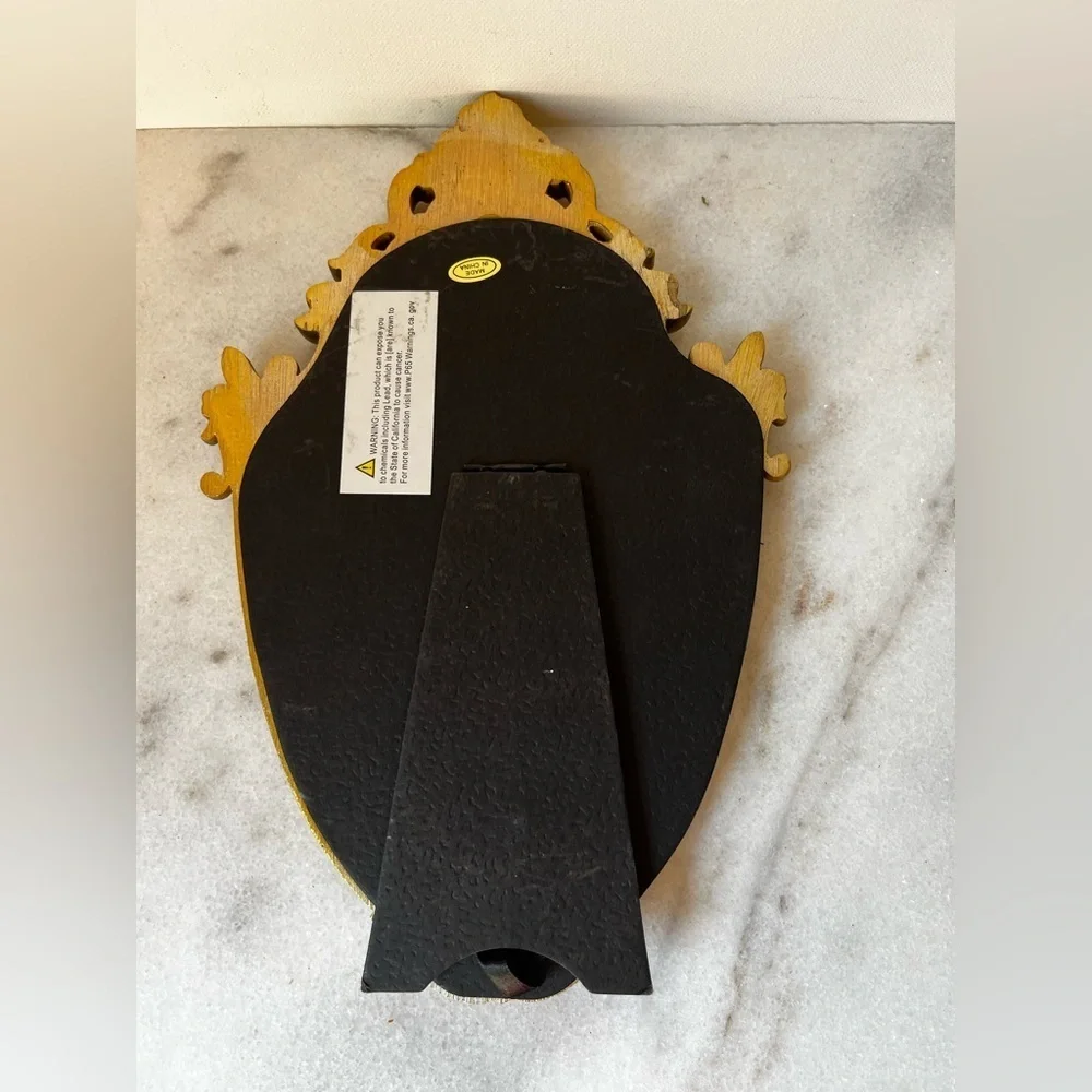 Ornate Gold and Black Decorative Mirror
